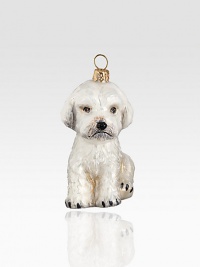 A charming addition to every dog-lover's holiday, carefully handcrafted in delicate Pyrex glass, then handpainted with beautiful, one-of-a-kind detail. Handpainted glass Each ornament takes 7-10 days to complete Arrives in gift box ideal for giving or storing 1½W X 3H X 2D Handmade in Poland 