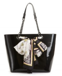 All wrapped up with a pretty bow: this basic yet bold shopper from DKNY is embellished with a flouncy silk star scarf that's removable in case it gets chilly.