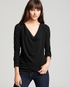 An elegant draped front enriches this Velvet by Graham & Spencer top with added flair. Just add denim andfête accompli!