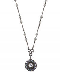 You'll come full circle in 2028's stylish round pendant necklace. Bedecked with aurora borealis crystals, it's set in hematite tone mixed metal. Approximate length: 16 inches + 2-inch extender. Approximate drop: 1 inch.