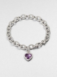 A sweet style with a textured sterling silver link chain and an amethyst heart charm. AmethystSterling silverLength, about 7.5Lobster clasp closureImported 