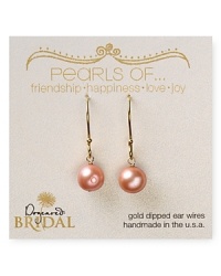 A delicate freshwater pearl is a perfectly understated touch on these earrings Dogeared. Designed to lend sweet sophistication to your aisle style, this pair is a total yes.