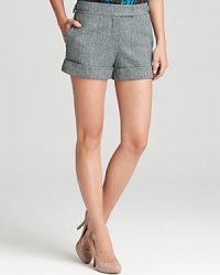 Slip brightly-colored tights or leggings beneath these leg-baring Trina Turk shorts for a fun fall look--classically cuffed, these stylish shorties cast a chic new look on a traditional tweed.