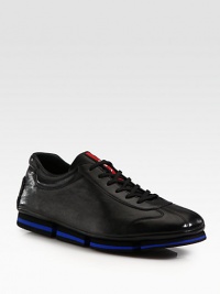 Sleek and sporty lace-up design rendered in Italian calfkskin leather.Leather upperPadded insoleRubber soleImported