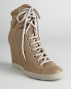 Lace on booties that successfully combine casual and athletic influences; by See by Chloé.