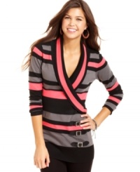 Sporting buckles, multicolor stripes and a wrapped shawl collar, Say What?'s long sleeve sweater promotes cute and toasty style!