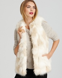 This warm, must-touch faux fur French Connection vest is the timeless fashion piece that offers a cozy-chic lookto your cold-weather wardrobe.