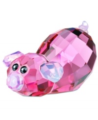 Pretty in pink. This little Piggy Sue figurine is cute, lovable and glittering in faceted rose crystal from her snout to corkscrew tail. An adorable essential for the Swarovski Lovlots collector.