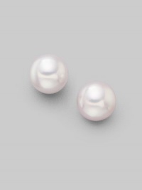 From the Akoya Collection. Classic white cultured pearl studs set in 18k gold. 7mm white round cultured pearls Quality: A 18k white gold Post back Imported