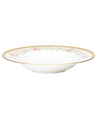 East meets West in the ornate Blooming Splendor soup bowl by Noritake. A Japanese-inspired pattern with raised dots encircles intricate florals rooted in white bone china.