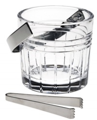 Plan a celebration around Tempo barware by Reed & Barton. Cut with a simple linear pattern, this crystal ice bucket elevates an event with timeless sophistication. Featuring stainless handle and tongs.