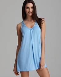 A romantic nightie, ruched at the neck with lace trim on the neckline.