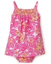 The perfect sunny dress for summer gatherings, this sleeveless bloomer and dress set is replete with bright floral patterns.