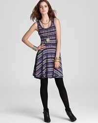 Enhanced with a classic fairisle print for extra flair and timeless style, this Free People dress flaunts a flared skirt with a fitted bodice for an always-flattering silhouette.