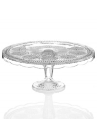 Past meets present. Feminine scalloped edges, raised medallions and fluted accents in sparkling glass make this Modern Vintage cake stand a standout at the table and on display. From the Godinger serveware collection.