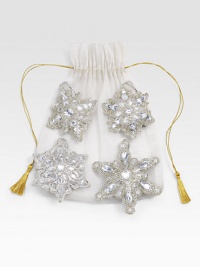 EXCLUSIVELY AT SAKS.COM. A new Christmas tradition from renowned designer Sudha Pennathur, handcrafted and beaded with all the sparkle of a holiday snowflake. Set of 4 ornaments in silver pouch Woven loops Each: 4½ diam. Imported 