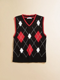 A classic knit vest is crafted in plush cotton and accented with a colorful argyle design.V-neckSleevelessPullover styleCottonMachine washImported