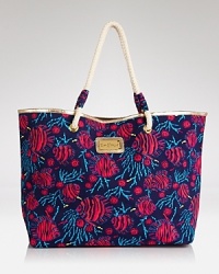 Perfectly Lilly Pulitzer, this tote is the perfect warm-weather carryall. Pair the print with coordinating flip flops and swimwear or tote the preppy stunner solo.