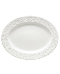 An elegant white-on-white dinnerware pattern featuring an embossed vine motif and interior glaze, the Opal Innocence Carved collection of dinnerware and dishes gets your table set for refined dining every day.