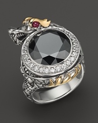 John Hardy's mystical Naga Batu ring glows with ruby eyes and a faceted hematite stone.