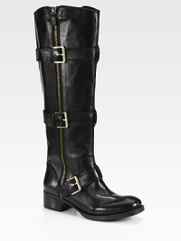 Undeniably cool leather design with adjustable buckle straps, exposed zippers and a stacked heel. Stacked heel, 1½ (40mm)Shaft, 16½Leg circumference, 15Leather upperExposed zipper on both sidesAdjustable buckle strapsLeather liningRubber solePadded insoleImported