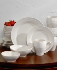 Accommodate parties of four in a snap with this 20-piece Swirl white set from Mikasa dinnerware. The dishes evoke the natural appeal of hand-thrown pottery, bringing unfussy elegance to your table in white stoneware. Coordinates with the existing Swirl collection.