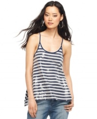 A nautical stripe gets a shot of shimmer from a generous dose of sequins at the front of this petite DKNY Jeans top. The swingy silhouette is totally on-trend for the summer.