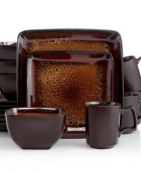 Uniquely chic, the Kenzo dinnerware set is finished with a reactive glaze that ensure no two pieces are exactly alike. Gibson's geometric forms and amber tones in durable stoneware do wonders for casual dining.