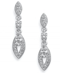 Light as a feather. Eliot Danori's stunning earrings feature an elongated feather shape decorated by sparkling crystals and cubic zirconia (1/2 ct. t.w.). Set in rhodium-plated mixed metal. Approximate drop: 3/4 inch.