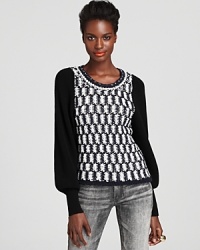 Warm up your cold-weather wardrobe with this richly-textured MARC BY MARC JACOBS sweater featuring a domino-inspired print in a lush wool blend.