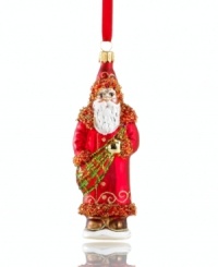 All dressed up and ready to go, this glitzy Santa Claus ornament from Vaillancourt features oodles of sparkle and beading in shades of red, gold and green.