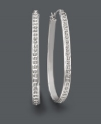 Seamless sparkle for timeless style. These fashionable hoop earrings shine with the addition of round-cut diamond accents. Crafted in sterling silver. Approximate diameter: 1-3/4 inches.