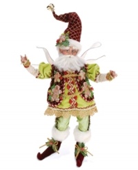 Keep company in the kitchen. Wearing a vest of gingerbread men and a cookie in his hat, this fantastical figurine from Mark Roberts inspires dazzling desserts from a windowsill or shelf. Bend his limbs to sit or stand.