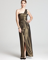 In fluid, shimmering fabric, this BCBGMAXAZRIA gown lends statement style in a spotlight-ready one shoulder silhouette. Pair with vintage-inspired jewelry to complete the look.