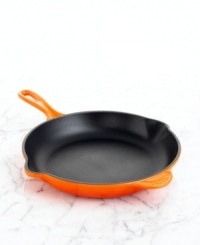 A classic kitchen workhorse, Le Creuset's heavyweight skillet is a culinary tradition crafted to sear and fry with professional precision. The expertly enameled cast iron exterior ensures uniform heating and even cooking, while the satin black enamel interior seals in juices and flavors. Limited lifetime warranty.