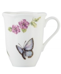 Grow your garden. The Butterfly Meadow Bloom mug from Lenox features the sturdy, scalloped porcelain of original Butterfly Meadow dinnerware but with fresh pink and violet blossoms.