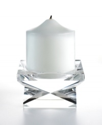 Give decor a distinctly modern edge with the Lexington pillar candle holder. Heavy crystal cut in a bold geometric shape brings acclaimed designer Oleg Cassini's keen sense of style right into your living room.