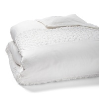 Bands of gathered, wispy cotton add texture to this duvet cover from DKNY.