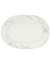 Birch branches grow around this pure white porcelain oval platter, turning formal tables into serene landscapes. A contemporary design refined in polished platinum with a breezy, all-natural beauty. From Noritake's collection of serveware and serving dishes.