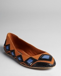 With lizard and snakeskin embossed accents, STEVEN BY STEVEN MADDEN's Shilah flats lend a worldly look.