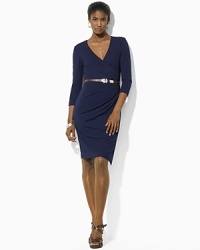 A flattering V-neckline and slender belted waist create a feminine silhouette that will quickly become a go-to essential.