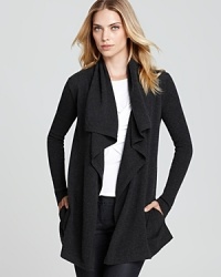 Wrap yourself in the ultimate fall layer--rendered in always-coveted cashmere with a romantic shawl collar.