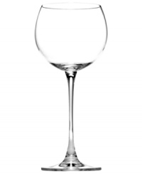 Inspired by the vineyards of Tuscany, the classic shape of this fine glassware collection captures the pleasures of Italy's famous wine country. The simple, understated base of these glasses is designed to accentuate the richly colored, aromatic wine filling the glass. Sip your favorite warm vintage from this beautifully designed glass.