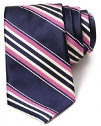 In a bright, electric palette, this boldly striped tie from Ike Behar lends a vibrant look.