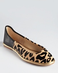 DIANE von FURSTENBERG fuses the espadrille and ballet flat with the unique Botswana shoe, crafted in luxe leopard printed pony hair and rich leather.