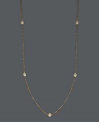 Layer yourself with inch upon inch of sparkle. Trio by Effy Collection's stunning necklace features seven stations of round cut, bezel-set diamonds (5/8 ct. t.w.) strung from a delicate, 14k gold chain. Approximate length: 24 inches.