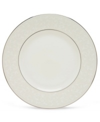 Pure opulence. Posh opalescence. This classically designed line of dinner plates from Lenox's dinnerware and dishes collection are accented by a platinum rim and a delicate flourish of vine-like, white-on-white imprints with raised, iridescent enamel dots. Great gift for housewarming, wedding or yourself. Dinner plate shown center.