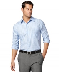 Handsome dress shirt with rich vertical stripes by Van Heusen.