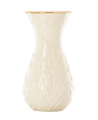 Lily of the valley springs from ivory porcelain, giving this Lenox Floral Meadow vase a delightfully understated grace. A band of sumptuous gold adds to its classic allure.