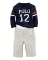 A sporty set pairs an essential fleece pant and an athletic cotton jersey tee with a faded graphic print.